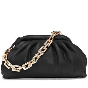 Black crossbody bag with gold chain